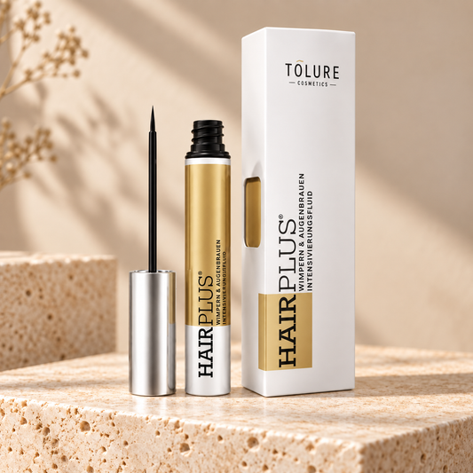 Tolure Hairplus vippeserum på travertin i samme beige billedstil.