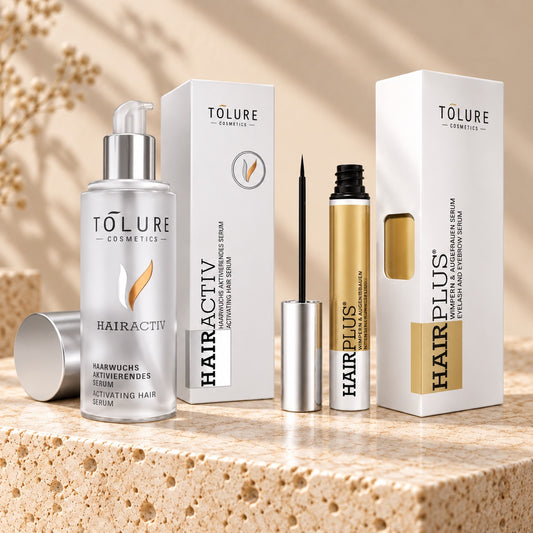 Tolure HairActiv hovedbundsserum 100 ml og Hairplus vippeserum 3 ml i sæt på travertin.