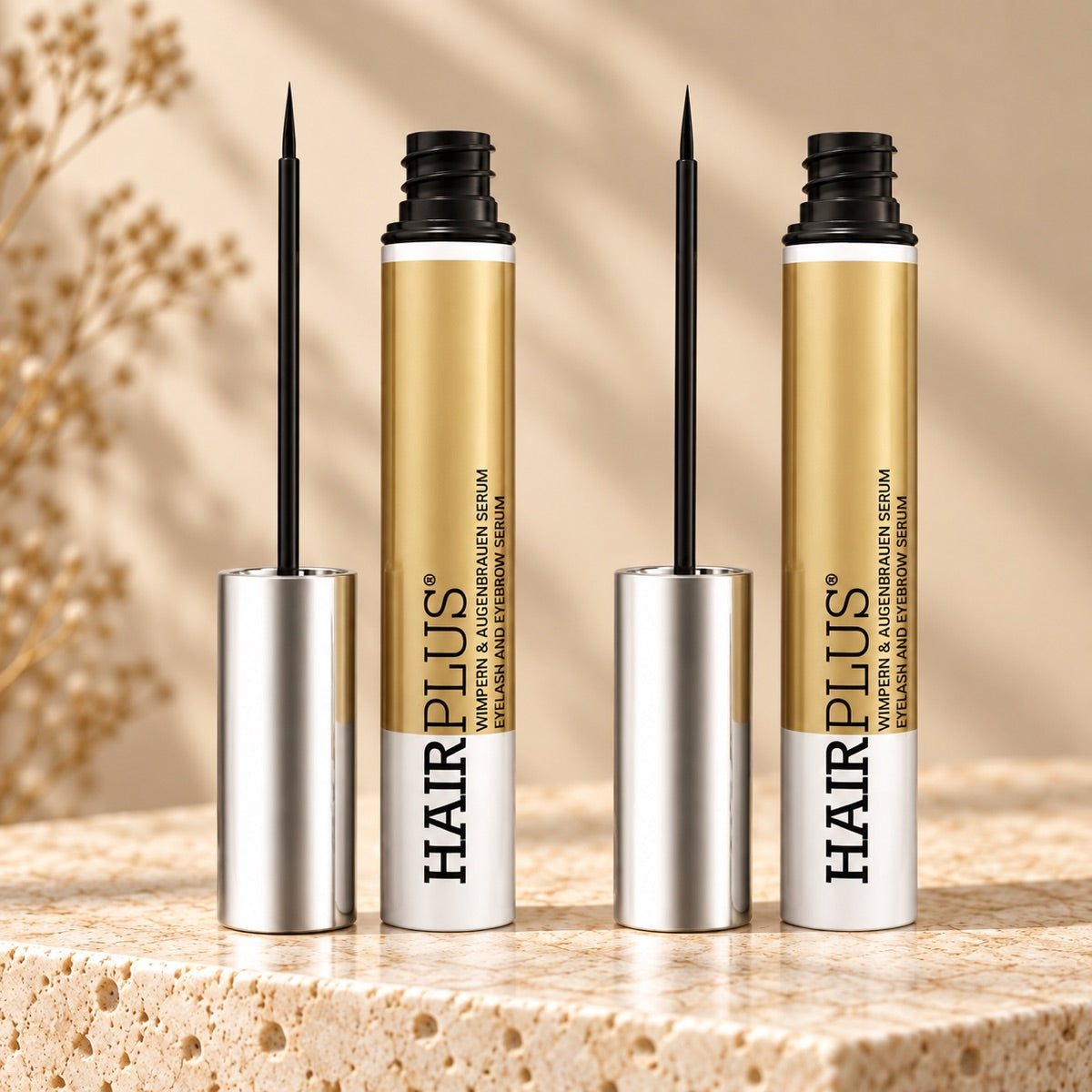 Tolure Hairplus 2-pack med to serumflasker à 3 ml og pensler på travertin.