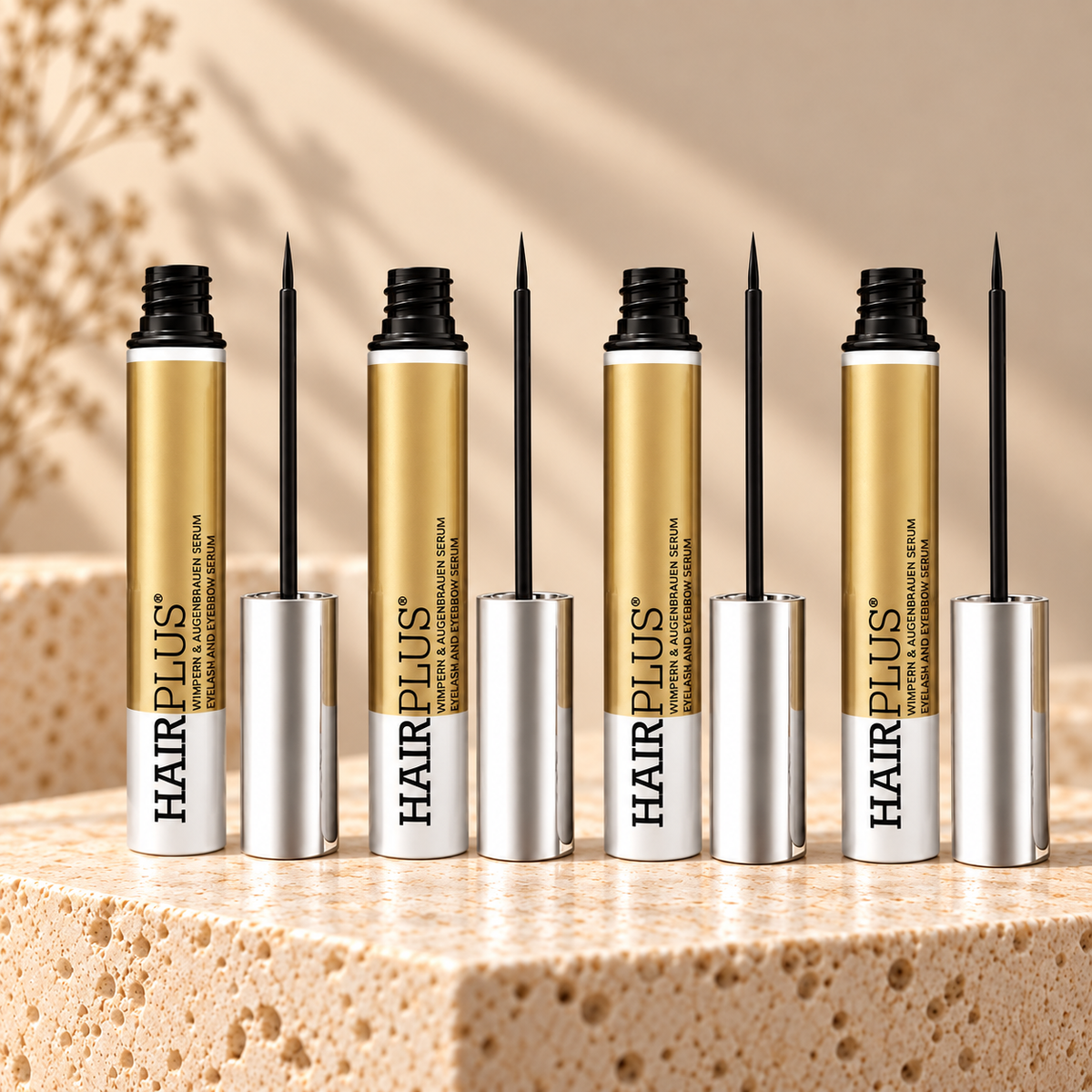 Tolure Hairplus 4-pack på travertin i samme beige billedstil.