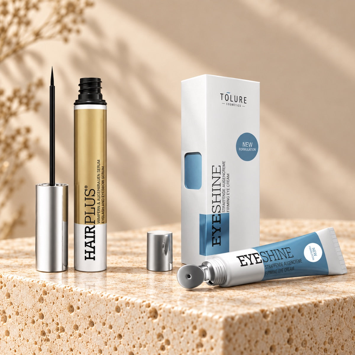 Tolure Hairplus vippeserum 3 ml og Eyeshine øjencreme 15 ml i sæt på lyst stenpodie.
