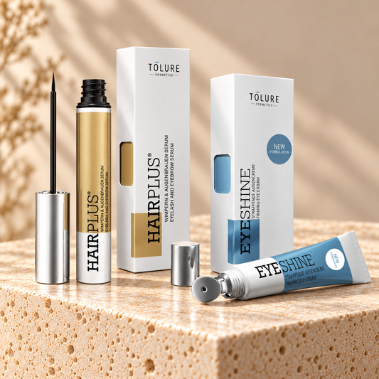 Tolure Hairplus og Eyeshine sæt på travertin i samme beige billedstil.