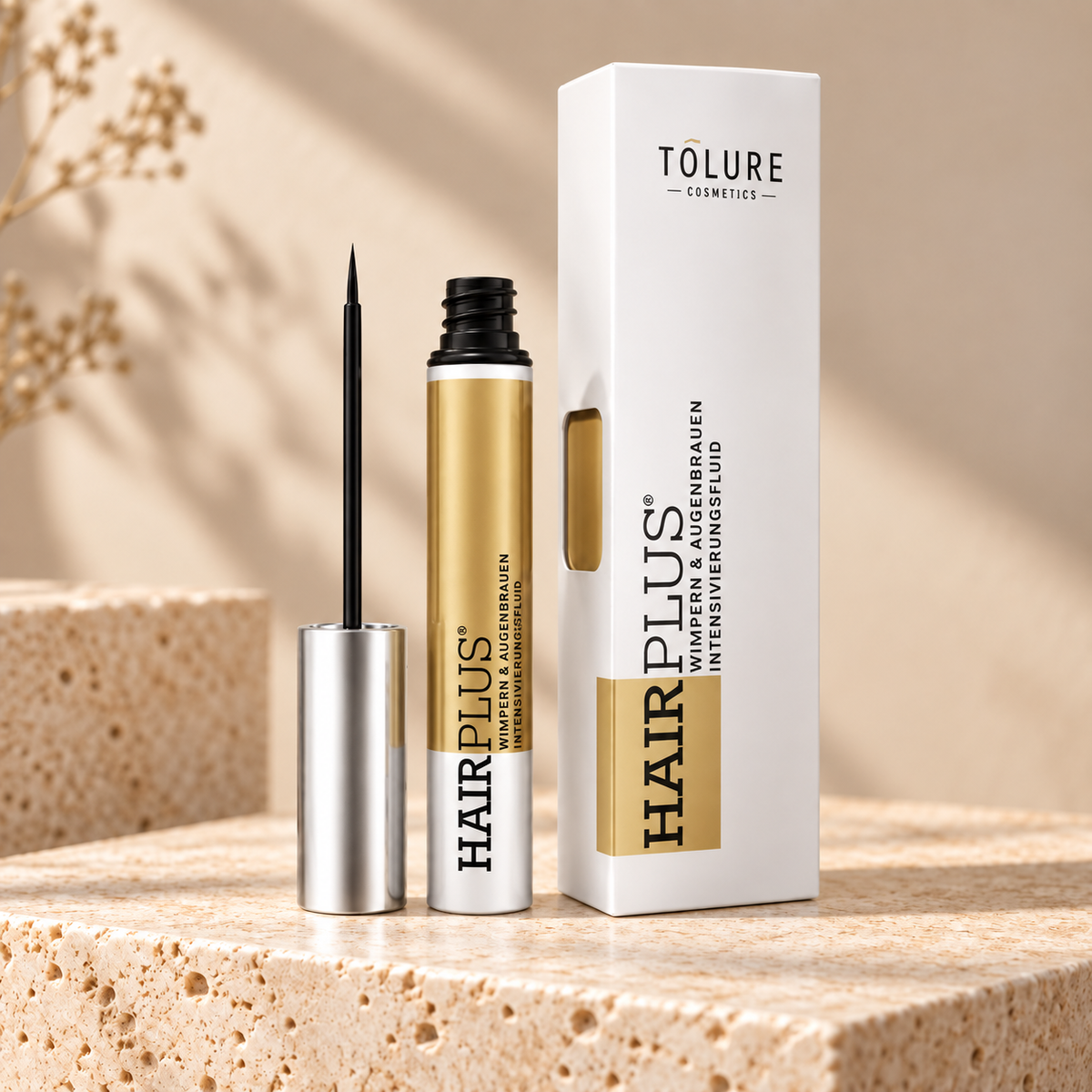Tolure Hairplus vippeserum på travertin i samme beige billedstil.