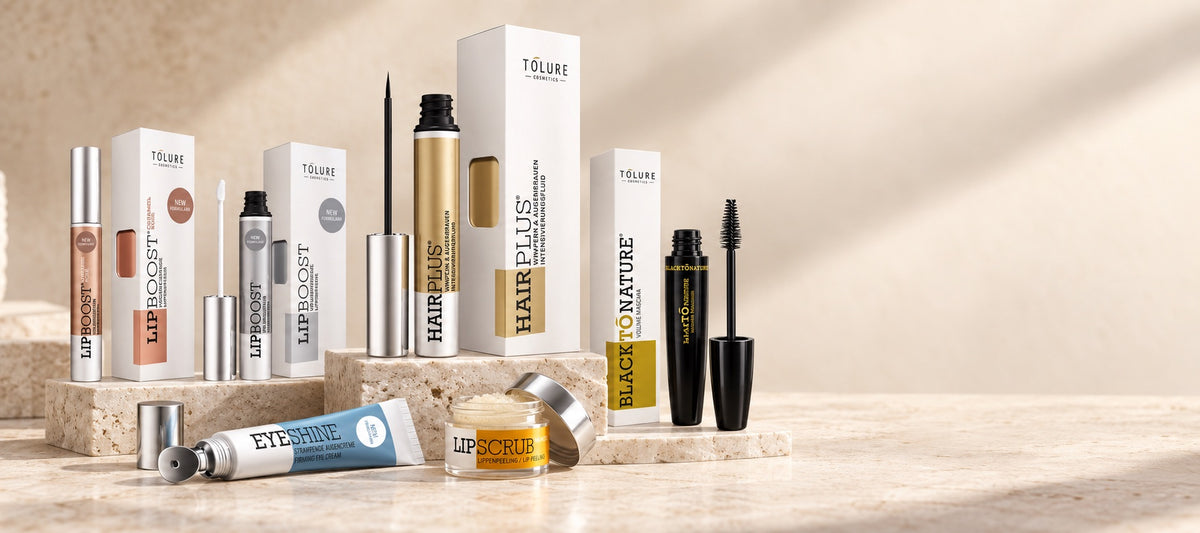 Tolure Hairplus, Lipboost, mascara, Eyeshine og Lipscrub på lyse stenpodier